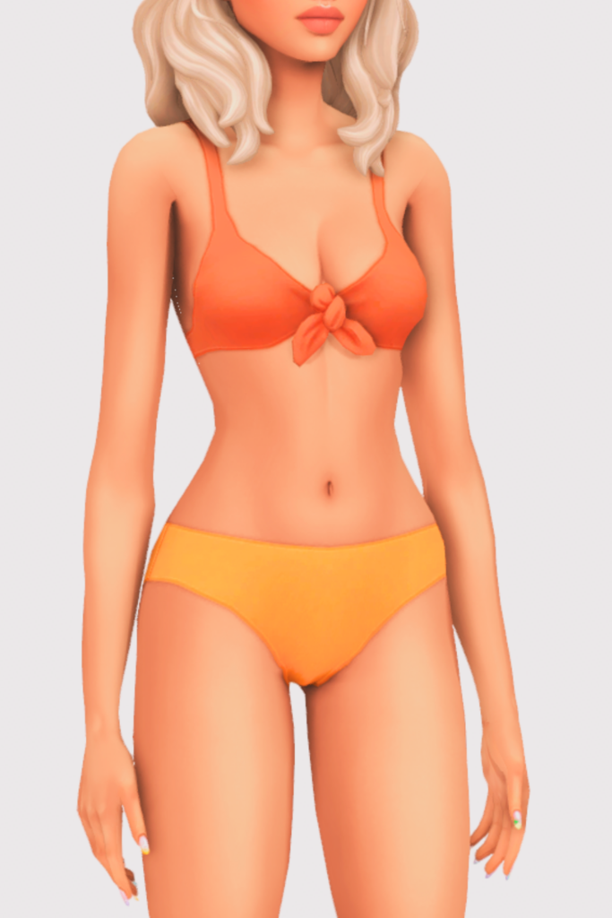 a female sim wearing a two piece cc swimsuit