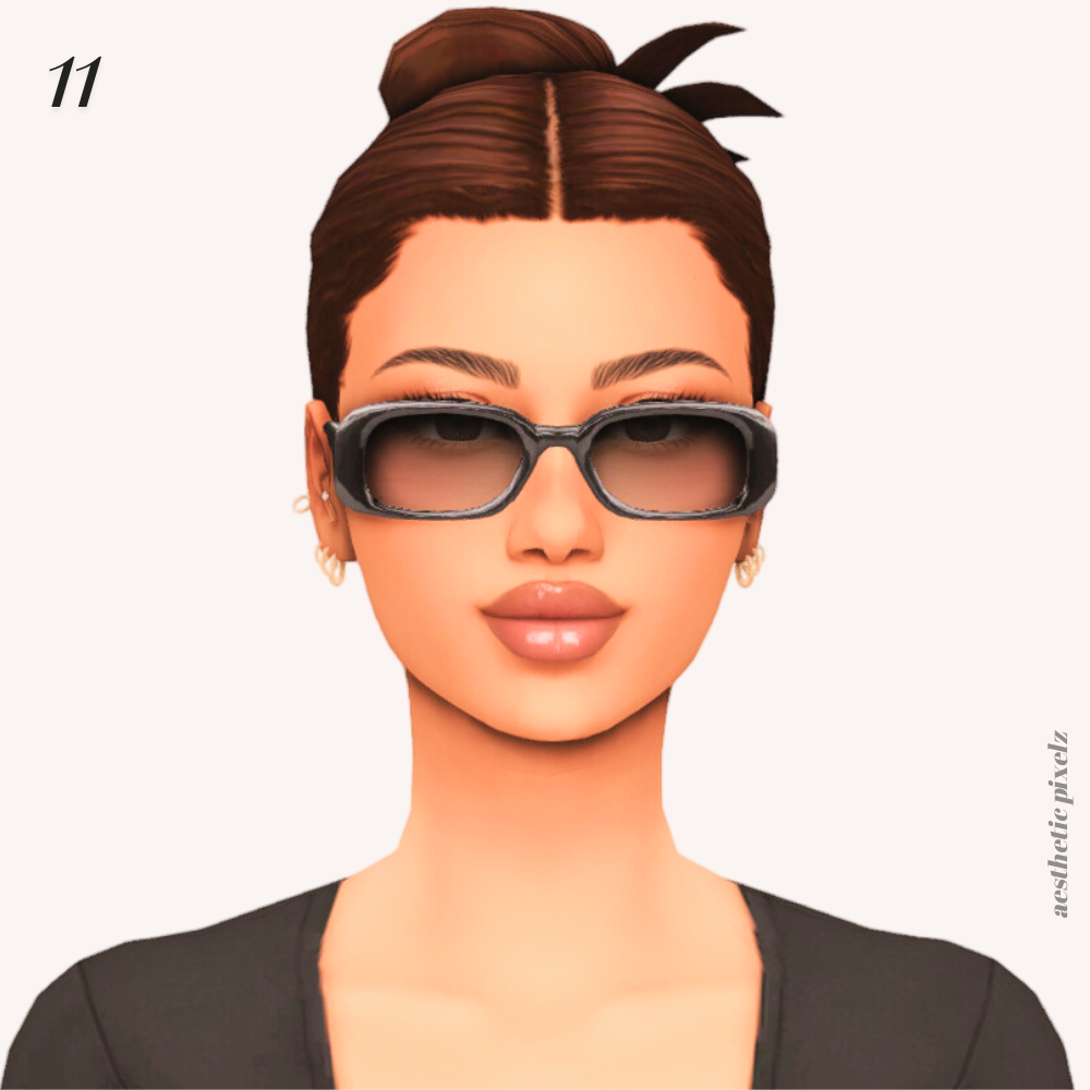 a sim wearing cc sunglasses and her hair in a bun
